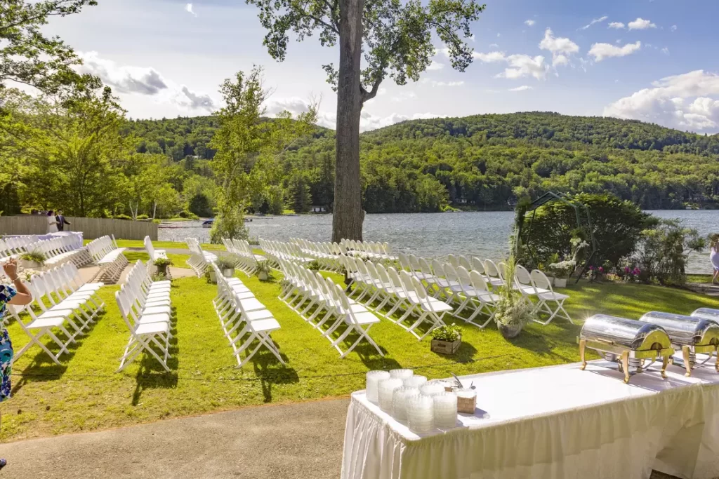Lake Morey Resort Wedding Photos Lakefront Ceremony Chair Setup with Buffet Tables
