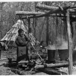 Native American making Maple Syrup