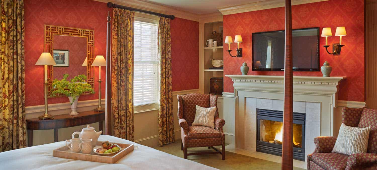 Green Mountain Inn - Red Bedroom Interior with Fireplace