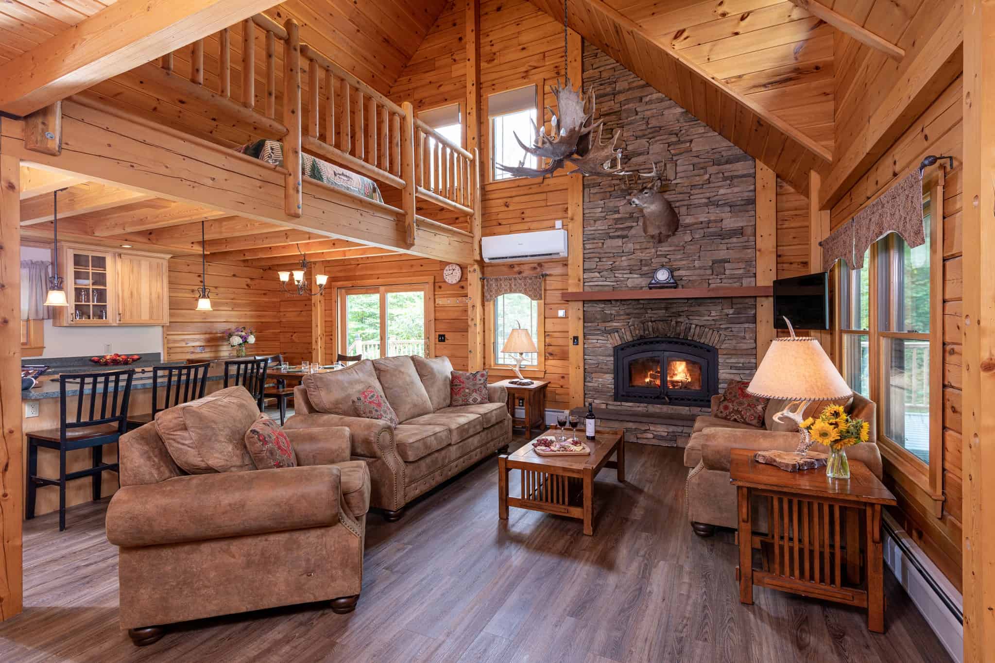 Sterling Ridge Resort Fireplace Living Room and Kitchen Log Cabin Interior