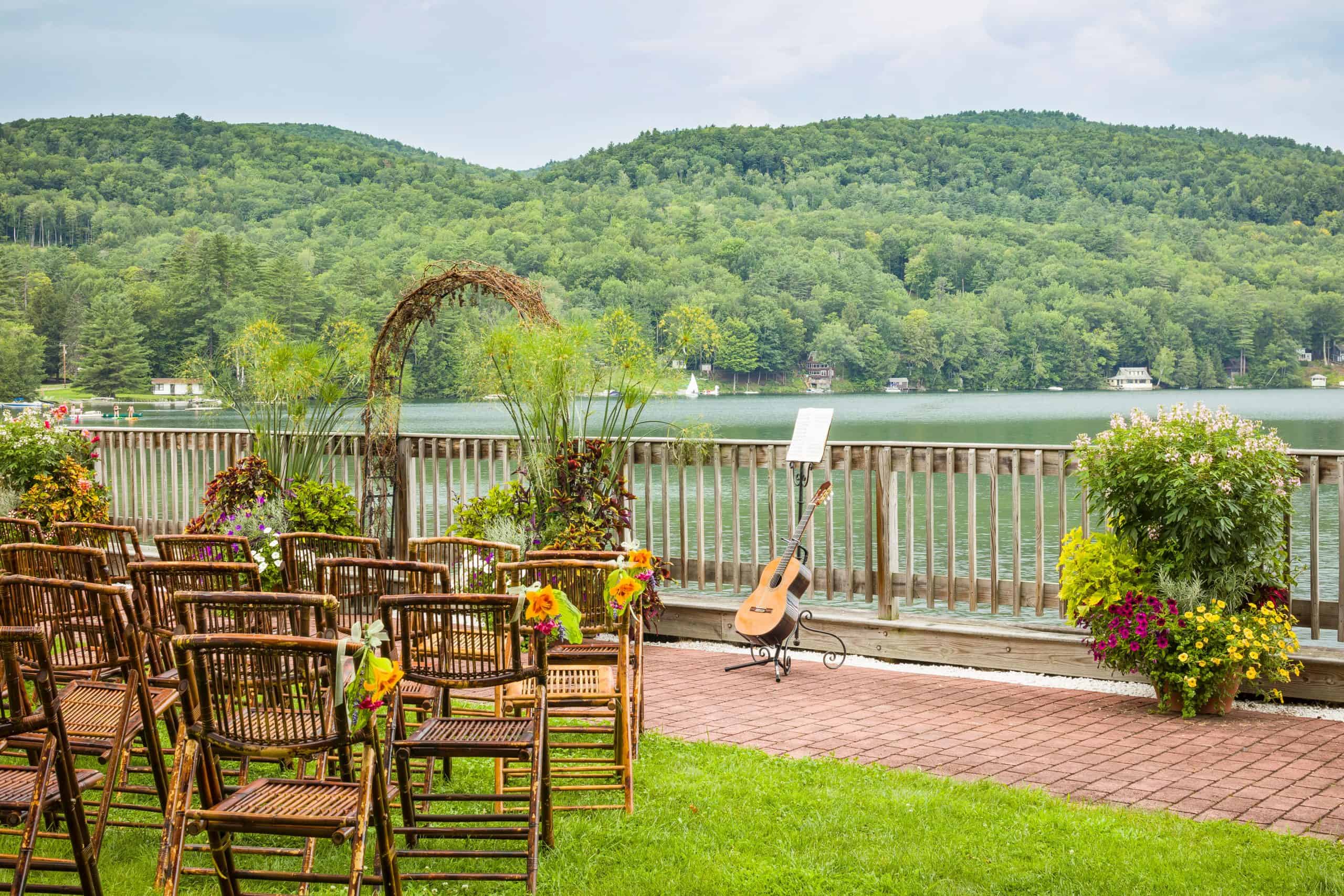 Lake Morey Resort - Summer Wedding with Arch Chairs Guitar and Lakeview