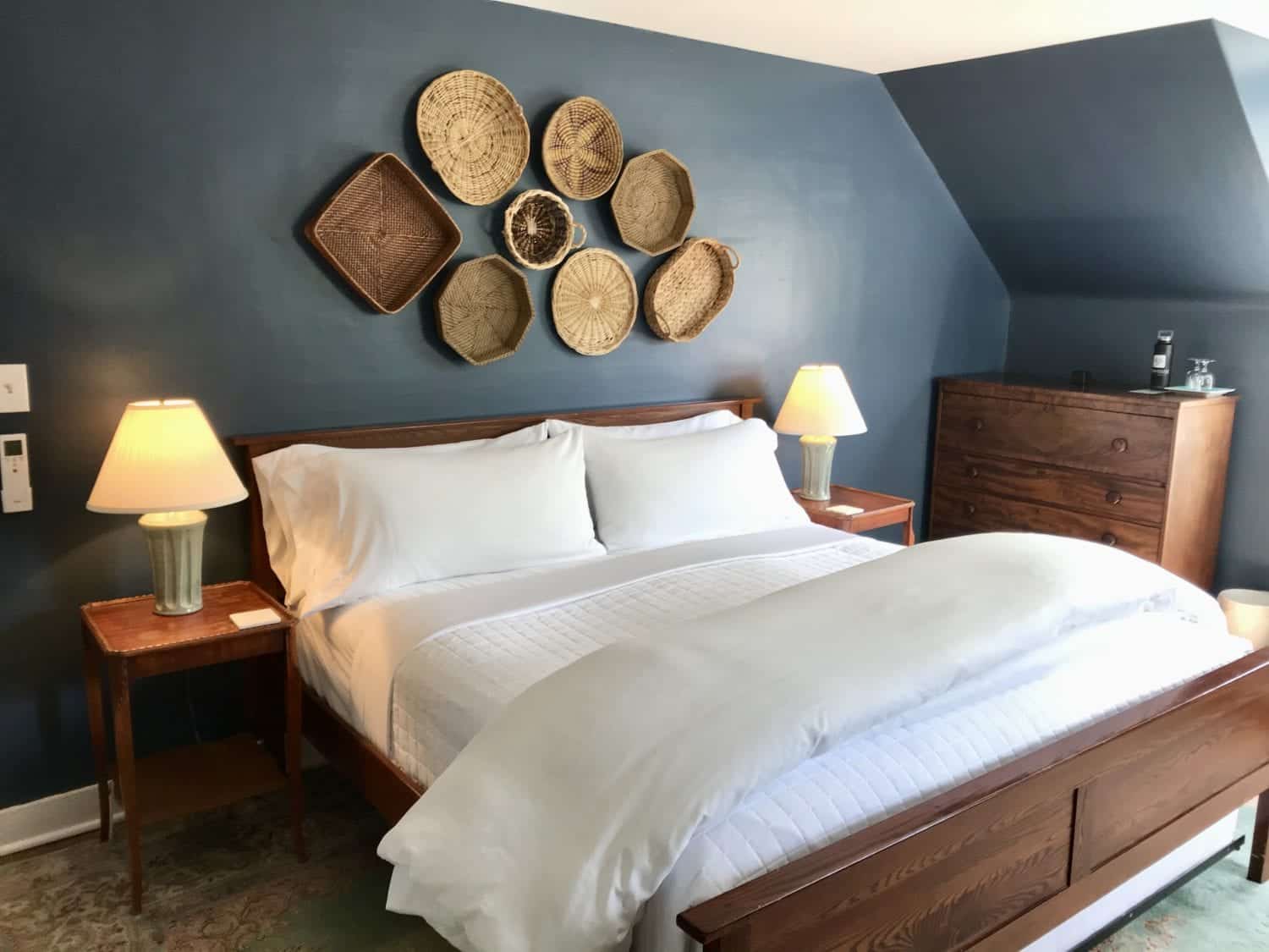 1824 House Inn + Barn - King Bed with Baskets on Wall