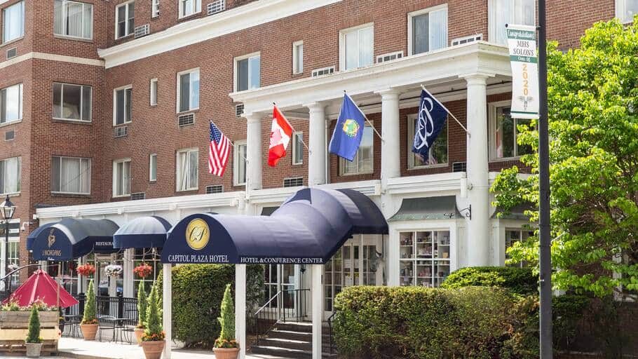 Capitol Plaza Hotel - Summer Exterior Entrance with Flags