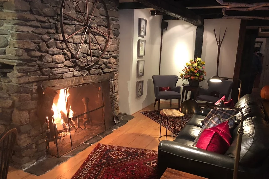 Inn at Weathersfield - Common Area with Large Fireplace