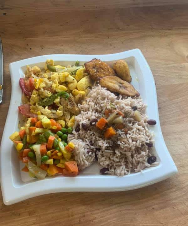 Jamerican Cuisine Food Truck - Jamaican style Akee and salted fish, served with a side of rice & beans, steamed veggies, and fried plantain