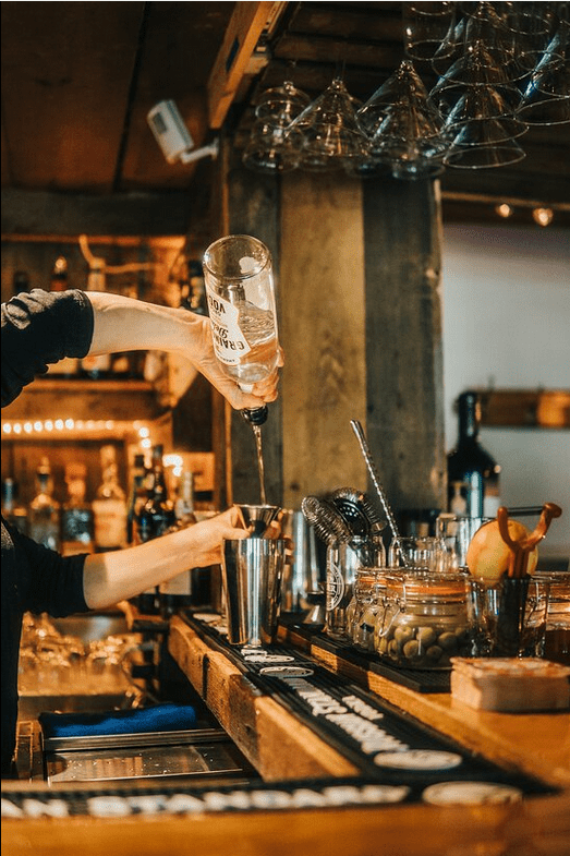 Tucker Hill Inn Restaurant - Bartender Mixing Drinks