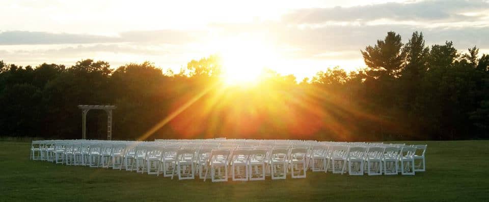 Burlington Country Club - Wedding Chairs and Arch at Sunset
