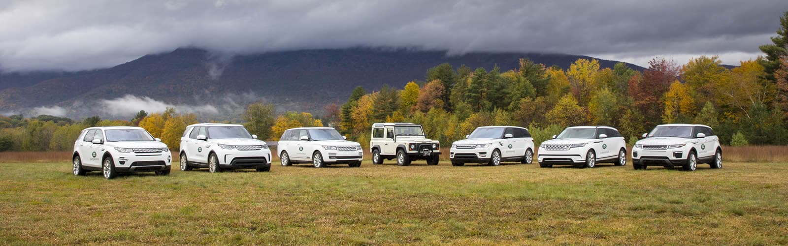 Land Rover Experience - Panorama of Vehicles and Mountains