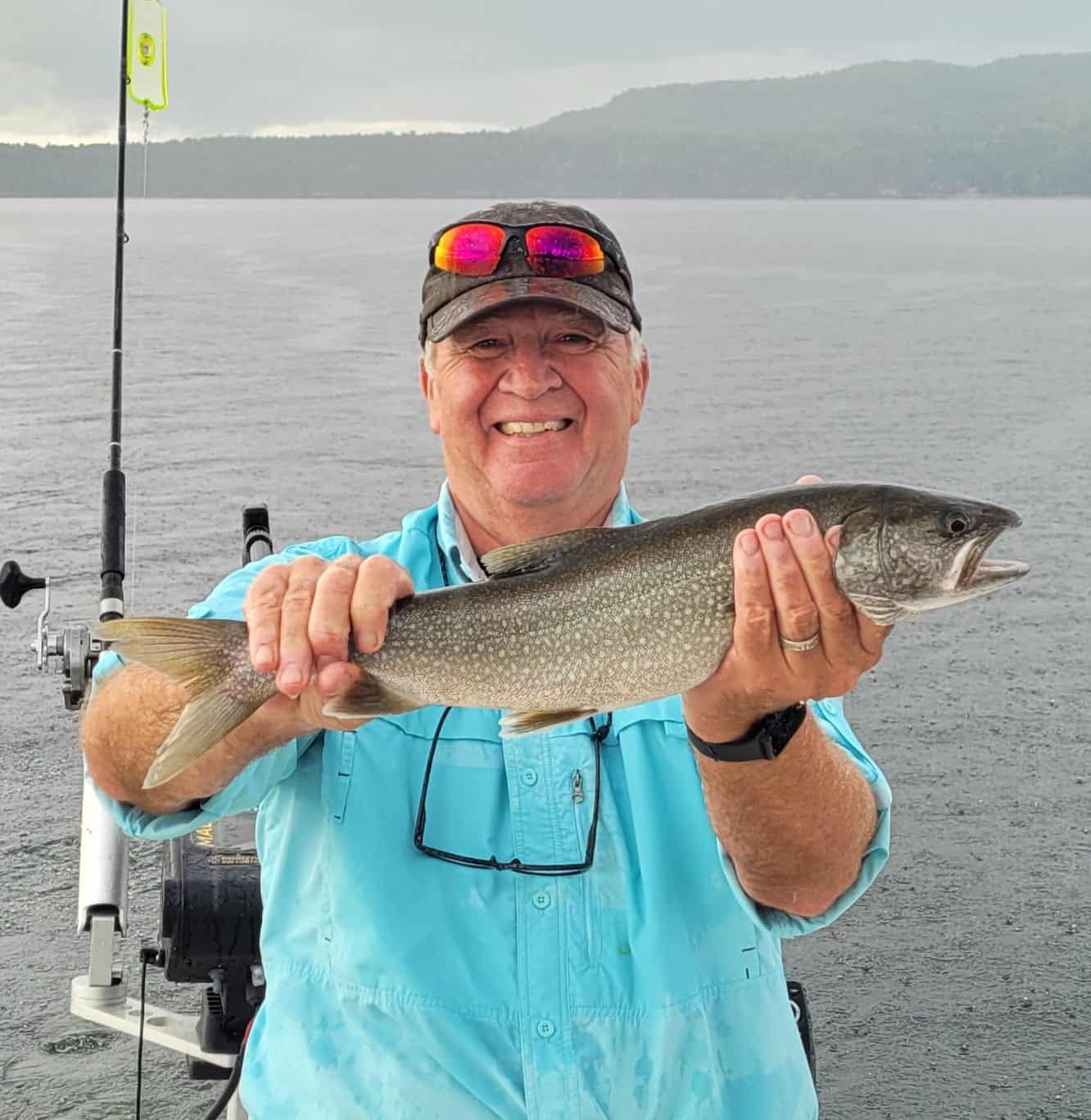 3rd Alarm Charters - Man with Lake Trout