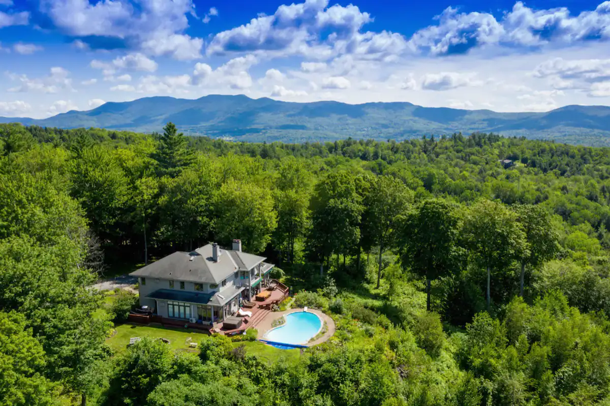 Majestic Mountain Spa Retreat - Waterbury Summer Arial of Pool and Mountains