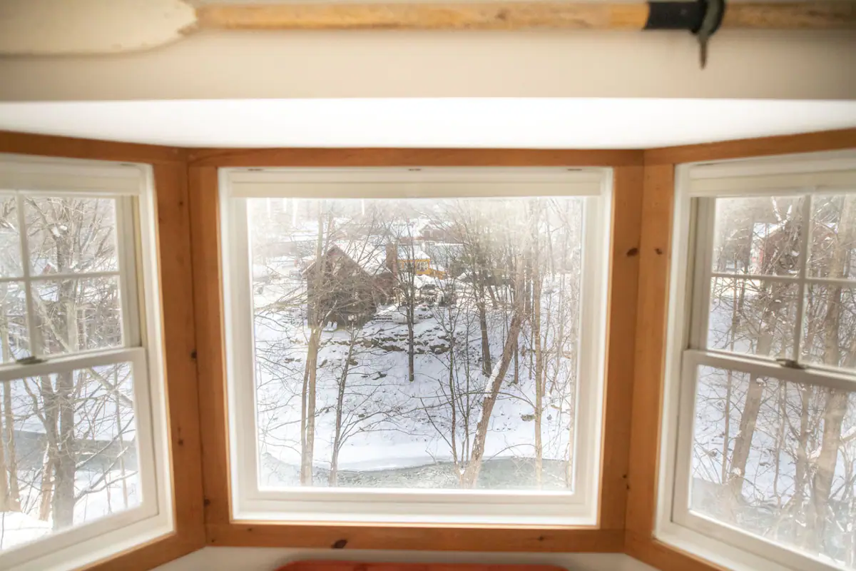 The Hygge House - Downtown Stowe Bedroom Window with Snow and River