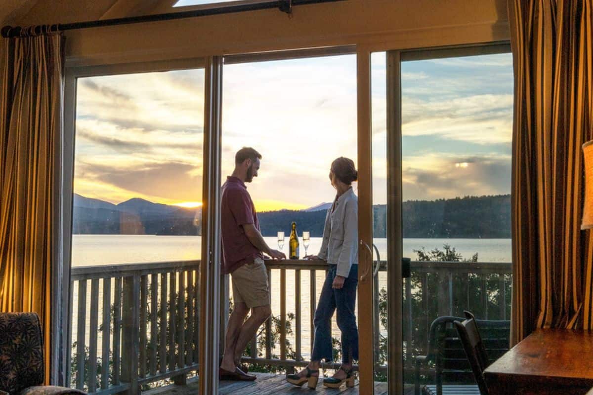 Basin Harbor Cottage Couple Cheers Sunset Wine